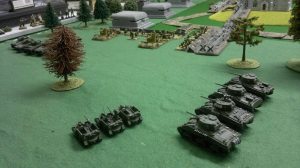 3 The plastic Battlefront Shermans of 6 Platoon approach the Germans