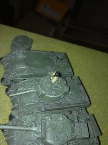 I Platoon commander looks on, horrified as one of his Shermans is destroyed by a bomb