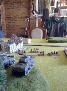 Maj. Rockwell looks on as the Pioneers take control of the objective.